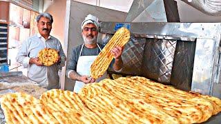 Baking delicious Barbari bread in an Iranian bakery: Video of making Barbari bread