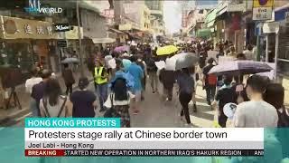 Hong Kong protesters stage rally at Chinese border town