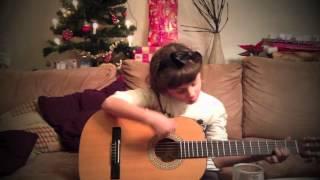 6 years old girl Mia M sings and plays guitar