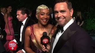 Tiffany Haddish checks On The Red Carpet's Karl Schmid's credit score at Vanity Fair Party... AGAIN!