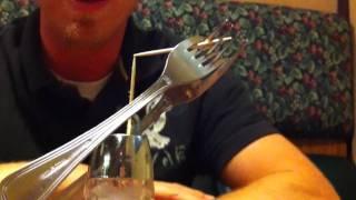 Balancing Forks on the Tip of a Toothpick Trick