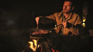 Beans in a pan in front of the fire. Relaxing video, no dialogue. Italian Alps