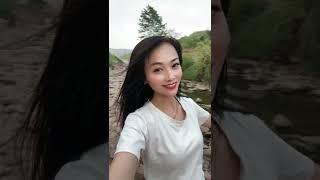 Pretty Chinese woman shows her long tongue on vacation