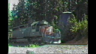 346. SOUTHERN PACIFIC SP 7303 WATER TOWER at  Cruzatte siding Oregon on August 10 1985 with 4