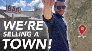 WE'RE SELLING A TOWN!