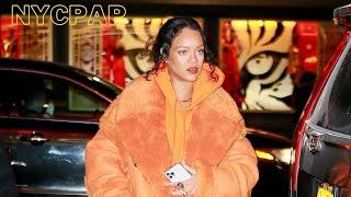 Rihanna covers her baby bump while out shopping in New York City