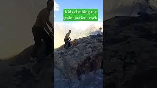 Hunza kids climbing the giant rock at zero point borith#zeropoint #borithlake #gilgitbaltistan