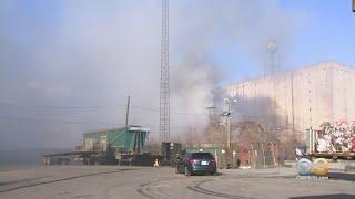 Windy Weather Making It Difficult For Camden Firefighters To Get Scrapyard Fire Under Control
