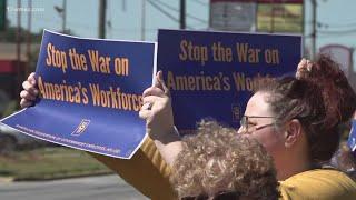 Federal workers rally against job cuts at Robins Air Force Base