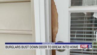 Burglars bust down door to break into Greensboro home