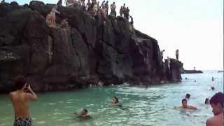 Cory and Mitchell 1st jump off the rock   North Shore Beach HI