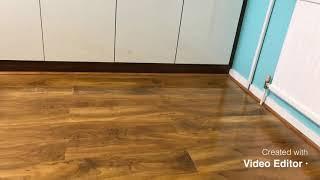 IBM Builders&Renovation-dolce walnut effect laminate flooring on floorboards.