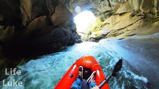 Packrafting through a cave on Vancouver Island