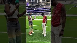 Henrie and Wizkid at Tottenham Stadium