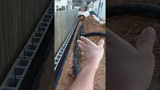 waterproofing cinderblock landscape retaining walls in Birmingham Alabama