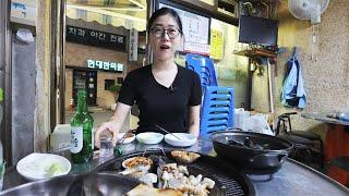 At midnight, she is the happiest 33-year-old woman to drink soju alone after work.