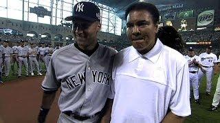 AL@NL: Muhammad Ali helps throw out the first pitch