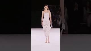 Gigi Hadid's iconic hair flip 2020 VS 2023 