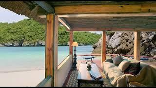 ENERGY HEALING AMBIENCE: Amazing veranda overlooking a sunny tropical beach!