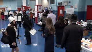 NYC residents come out in droves to cast vote on Election Day