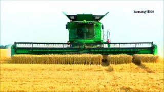 John Deere Mähdrescher S685i mit Raupe, 640D 12,34 m SW, biggest combine harvester - wheat harvest