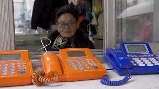 Holding the Line: Shanghai’s Last Public Phone Booth