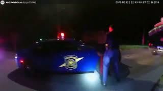 Body camera footage shows Michigan State Police trooper punching suspect