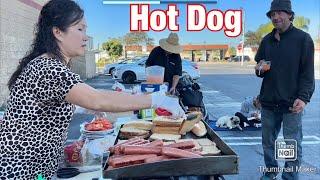 Cooking Hot Dog and Chicken Sandwiches  for The Homeless  People