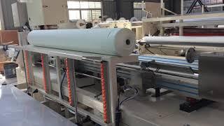 Full automatic kitchen towel rewinding machine and band saw cutting machine