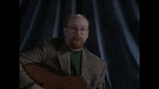 Sample: David Grier's Flatpicking Lesson, "Building Powerful Solos" on Homespun