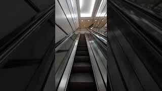 Up Ride on a Single-File Otis Escalator at Petronas Twin Towers, Kuala Lumpur