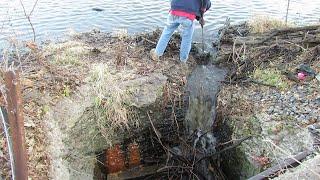 Unblocking Lake Drain Makes a Waterfall