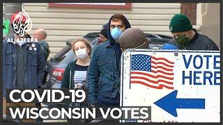 US state Wisconsin votes despite stay-at home orders