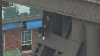 Man brings traffic to standstill by climbing Sydney Harbour Bridge