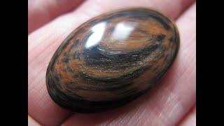 Polishing a Tiger Eye Stone Cabochon, step by step in detail.