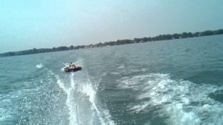 Husband and american bulldog Bulka doing tubing