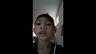 A kid singing high hopes