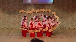 Stylized Japanese dance with fans (sakura flower)