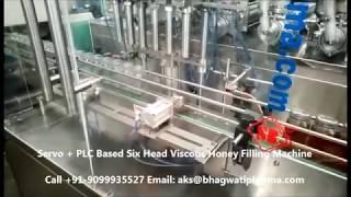 Servo + PLC Based Six Head Viscous Honey Filling Machine with Safety Cabinet