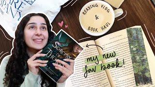 reading my favorite book of the year  + another big book haul 