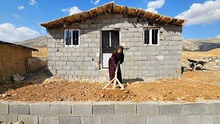 A widowed mother builds a house in the cold mountains for her children