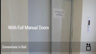 Strange Generic Service Elevator With Manual Doors