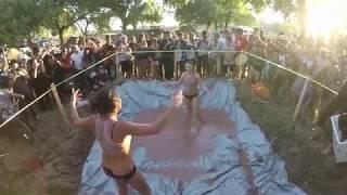 MUD WRESTLING GIRLS GO AT IT