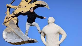 DESTROYING OUR GIANT CONCRETE STATUE!