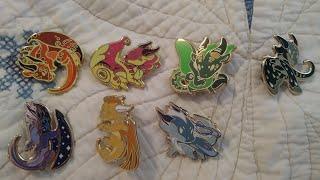 I got 7 of the Wings of Fire pins from Etsy!