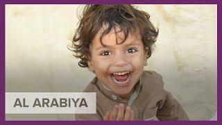 The story behind the happy, smiling photo of a Yemeni child