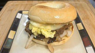 Steak and Egg Bagels w/ Provolone Cheese, Sauteed Mushrooms and Onions "Skip that drive thru"