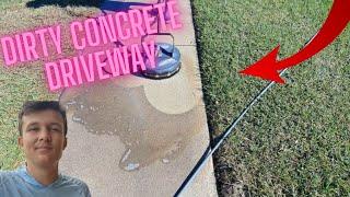 Pressure cleaning a DIRTY concrete driveway & soft washing front of house in Kissimmee!