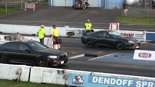 Toyota Supra vs BMW M5-drag race 1/4 mile