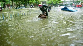 Flood Response in Action Unclogging Drains to Reclaim the Streets